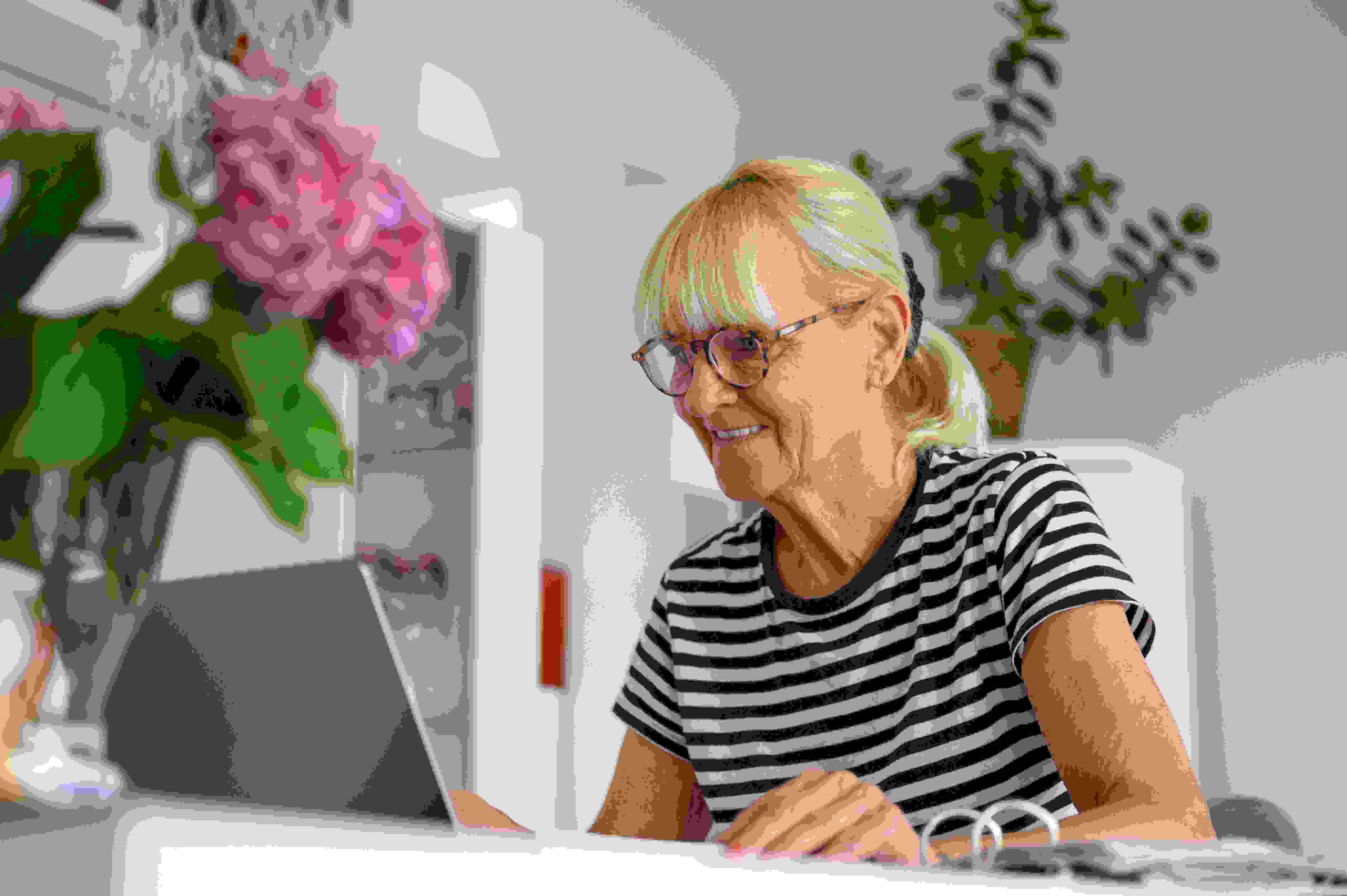 Happy Mature Woman Using Laptop In Living Room At 2023 11 27 05 19 15 Utc